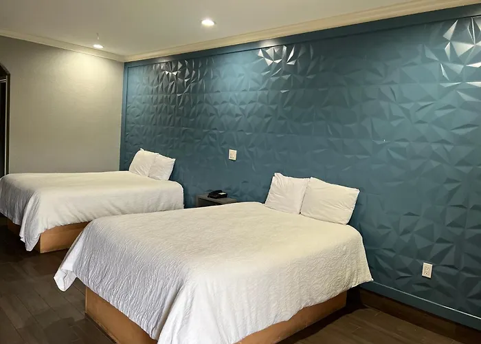 The Symphony Inn & Suites