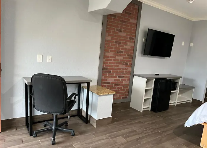 The Symphony Inn & Suites